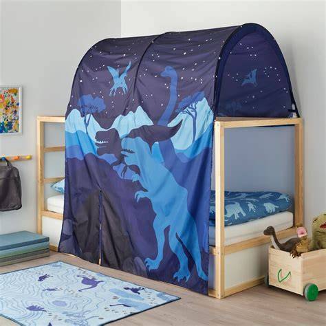 Tente dinosaure installée sur lit Kura